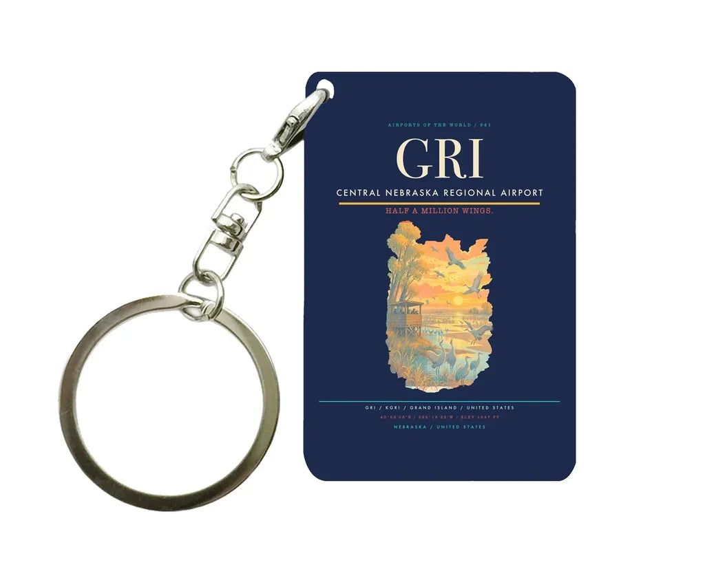 Central Nebraska Regional Airport (GRI) design on navy blue key chain