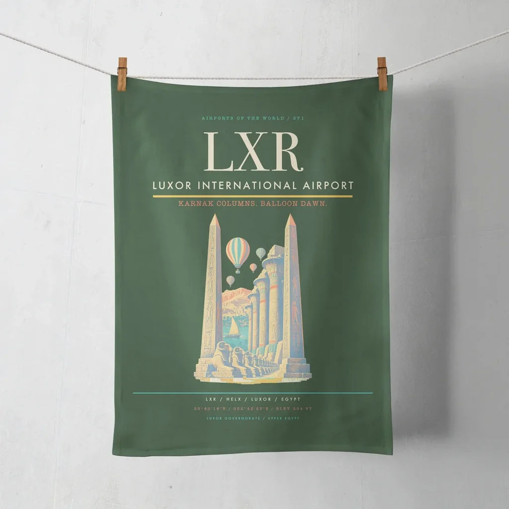 Luxor International Airport (LXR) design on dark green towel