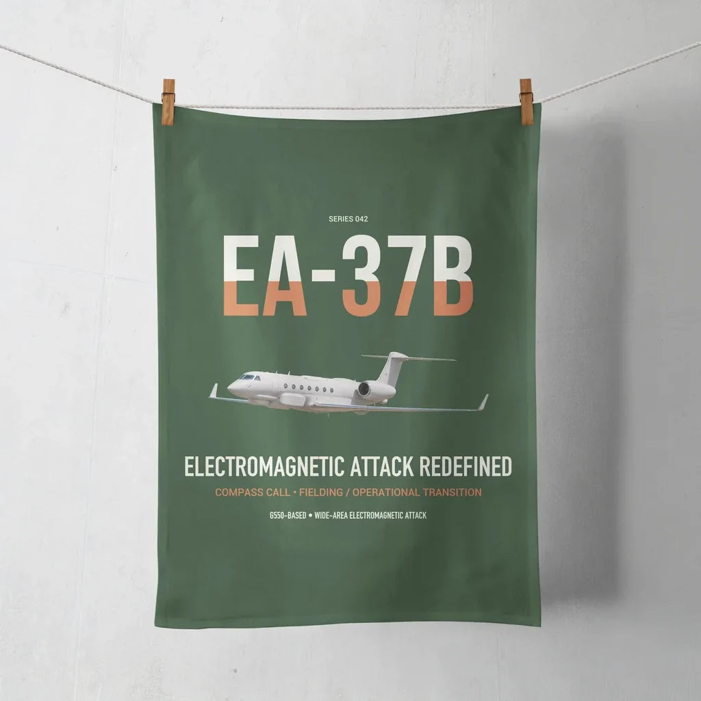 EA-37B Compass Call design on dark green towel