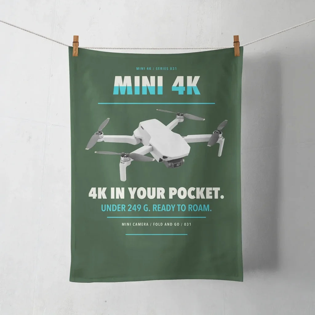 DJI Mini 4K design on dark green towel