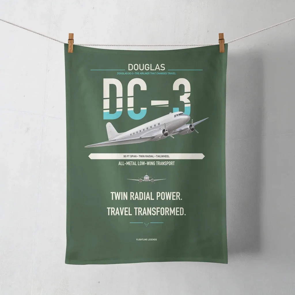 Douglas DC-3 design on dark green towel