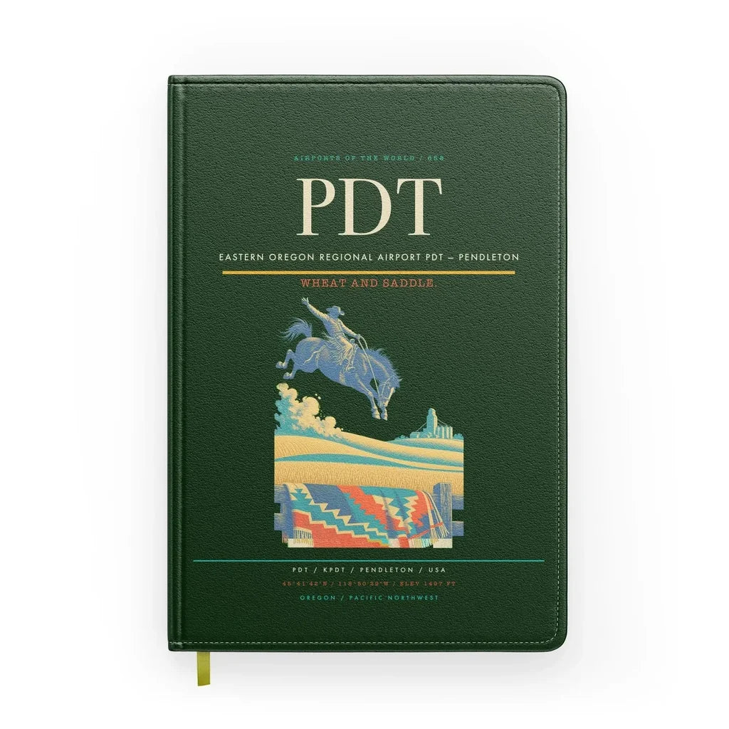 Eastern Oregon Regional Airport (PDT) design on dark green notebook