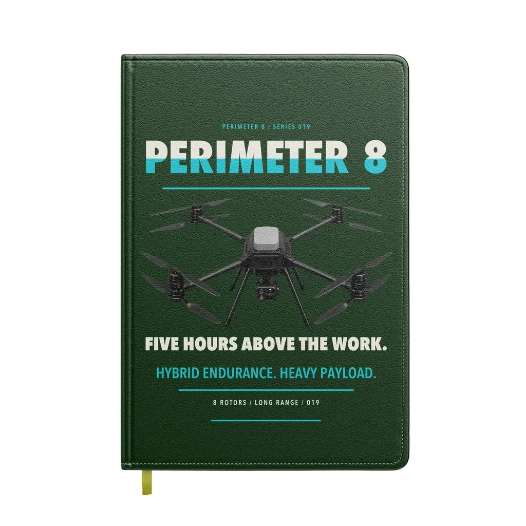 Skyfront Perimeter 8 design on dark green notebook
