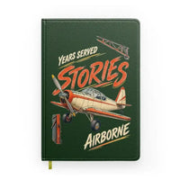 Thumbnail for Years Served Stories Airborne design on dark green notebook
