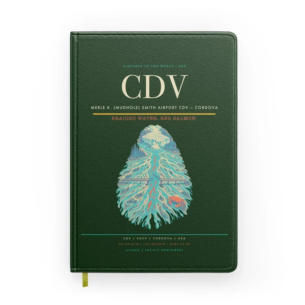 Merle K. (Mudhole) Smith Airport (CDV) design on dark green notebook