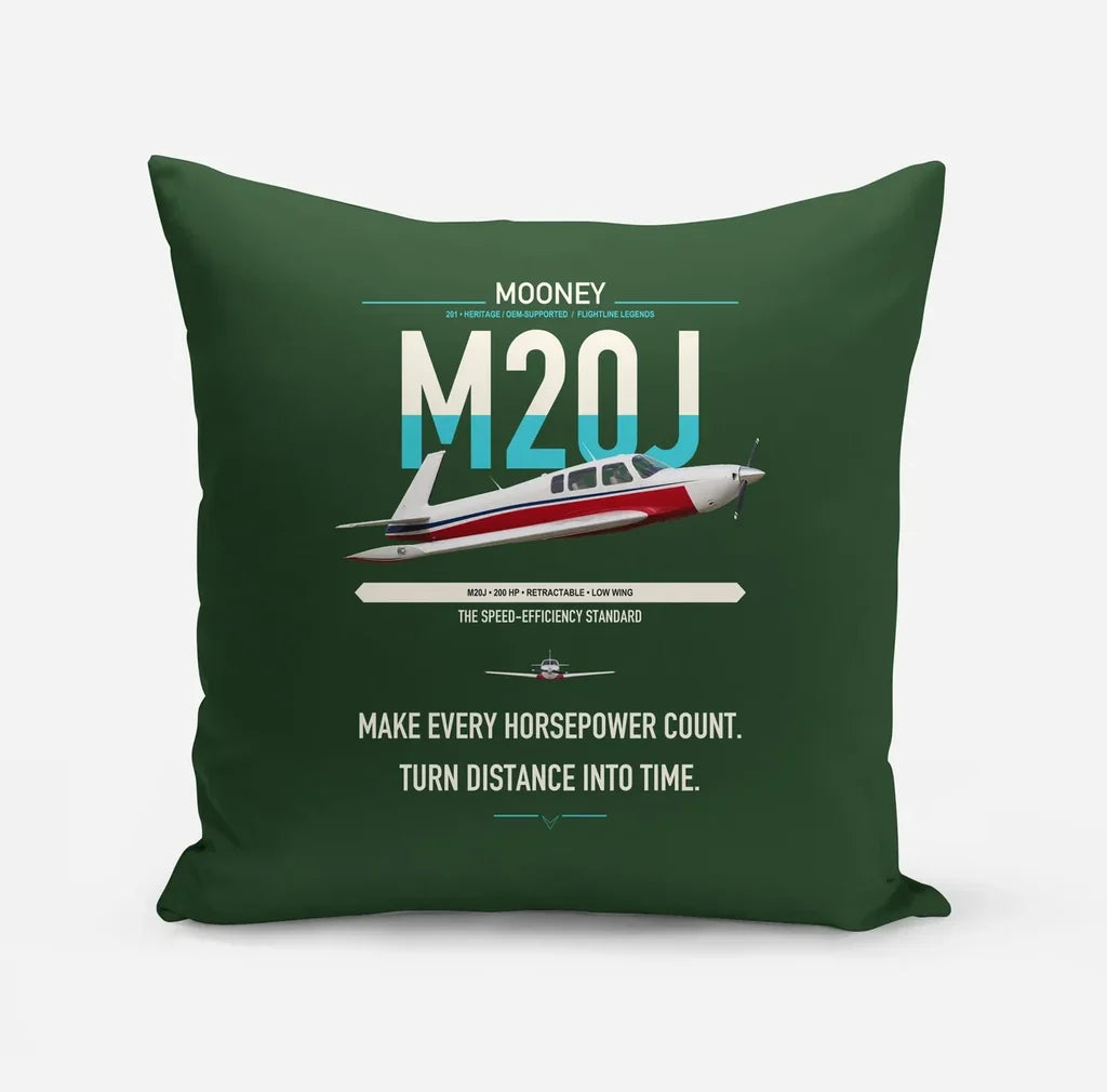 Mooney M20J 201 design on dark green pillow