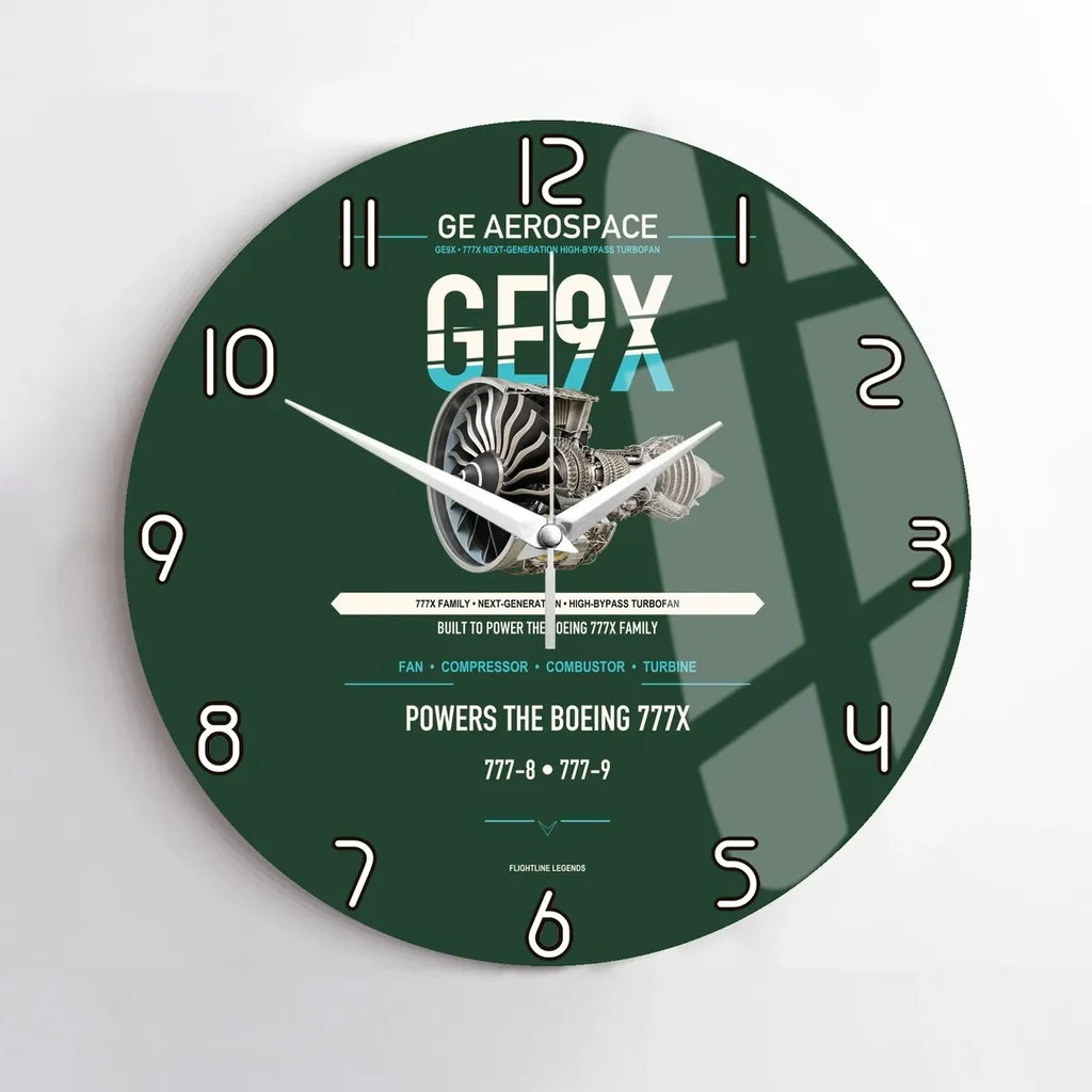 GE9X design on dark green no frame wall clock