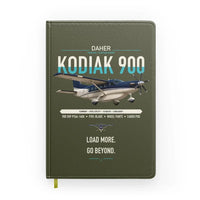 Thumbnail for Daher Kodiak 900 design on green army notebook