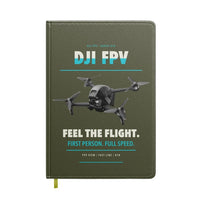 Thumbnail for DJI FPV design on green army notebook