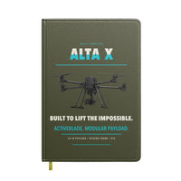 Thumbnail for Freefly Alta X design on green army notebook