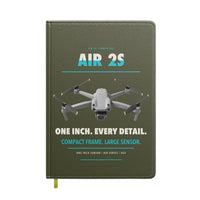 Thumbnail for DJI Air 2S design on green army notebook