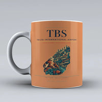 Thumbnail for International Airport TBS Mug design on orange tbilisi