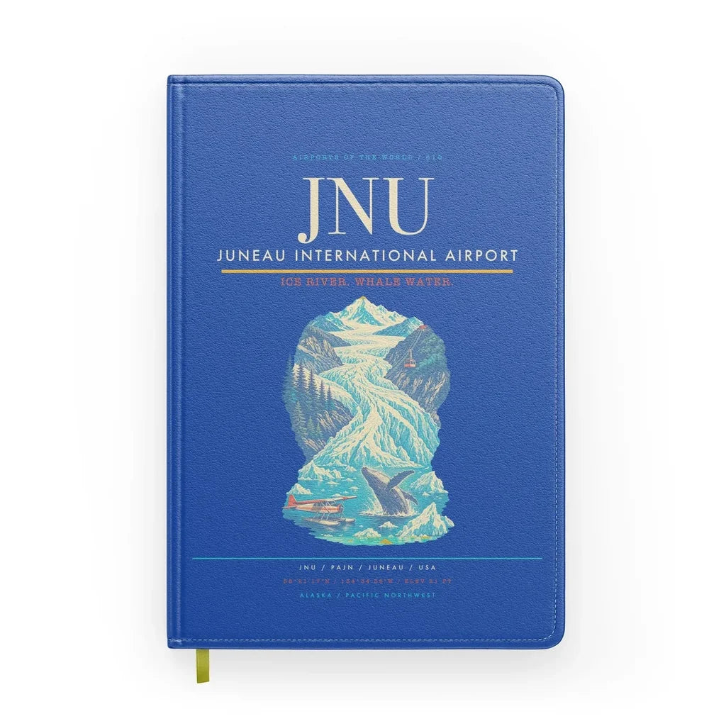 Juneau International Airport (JNU) design on blue notebook