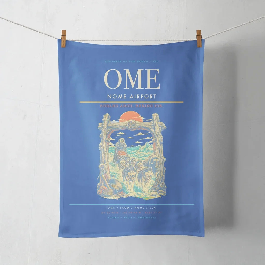Nome Airport (OME) design on blue towel