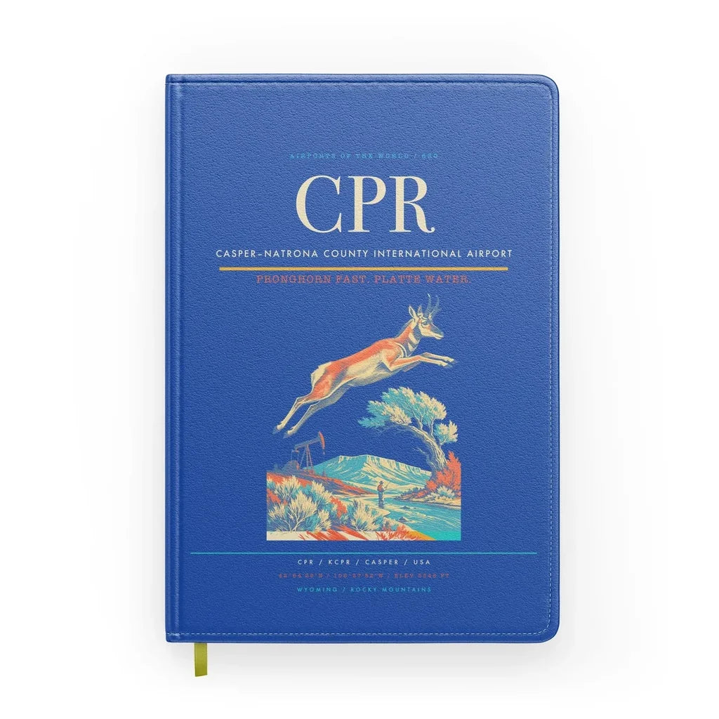 Casper–Natrona County International Airport (CPR) design on blue notebook