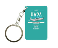 Thumbnail for Piper PA-24-250 Comanche 250 design on turquoise designed key chain, double-side print