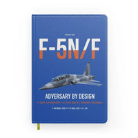 Thumbnail for F-5N F Adversary design on blue notebook