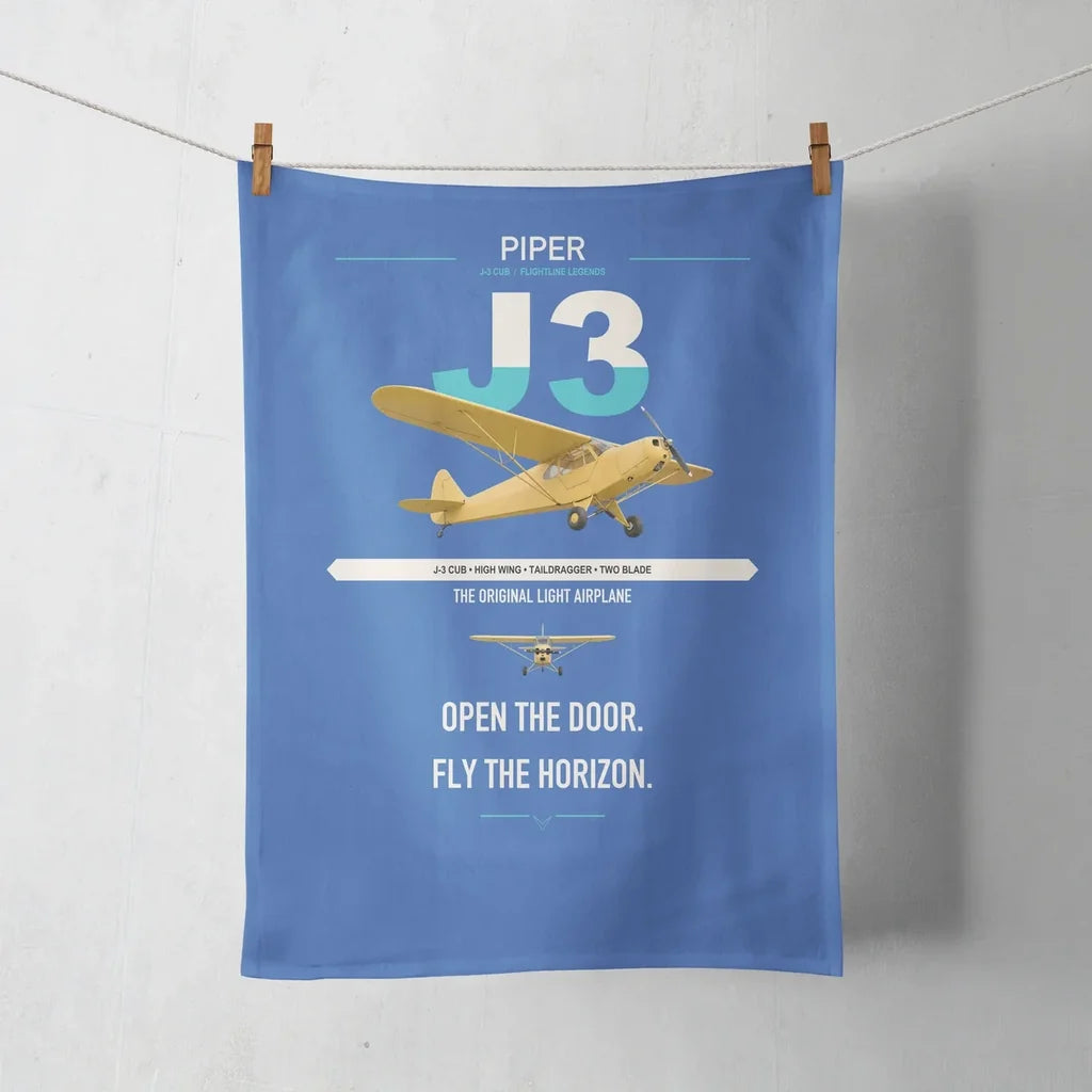 Piper J-3 Cub design on blue towel