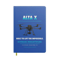 Thumbnail for Freefly Alta X design on blue notebook