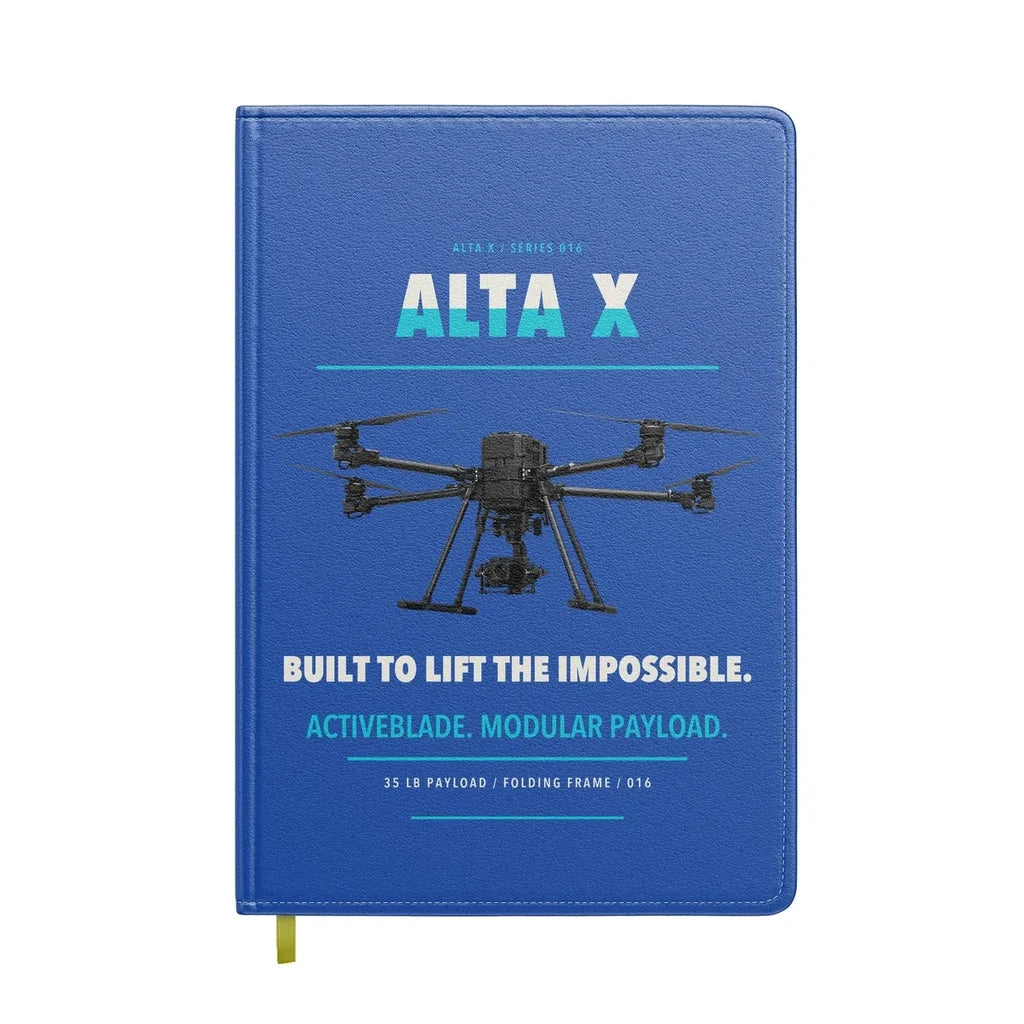 Freefly Alta X design on blue notebook