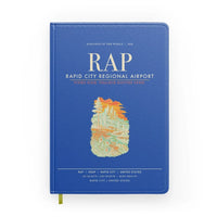 Thumbnail for Rapid City Regional Airport (RAP) design on blue notebook