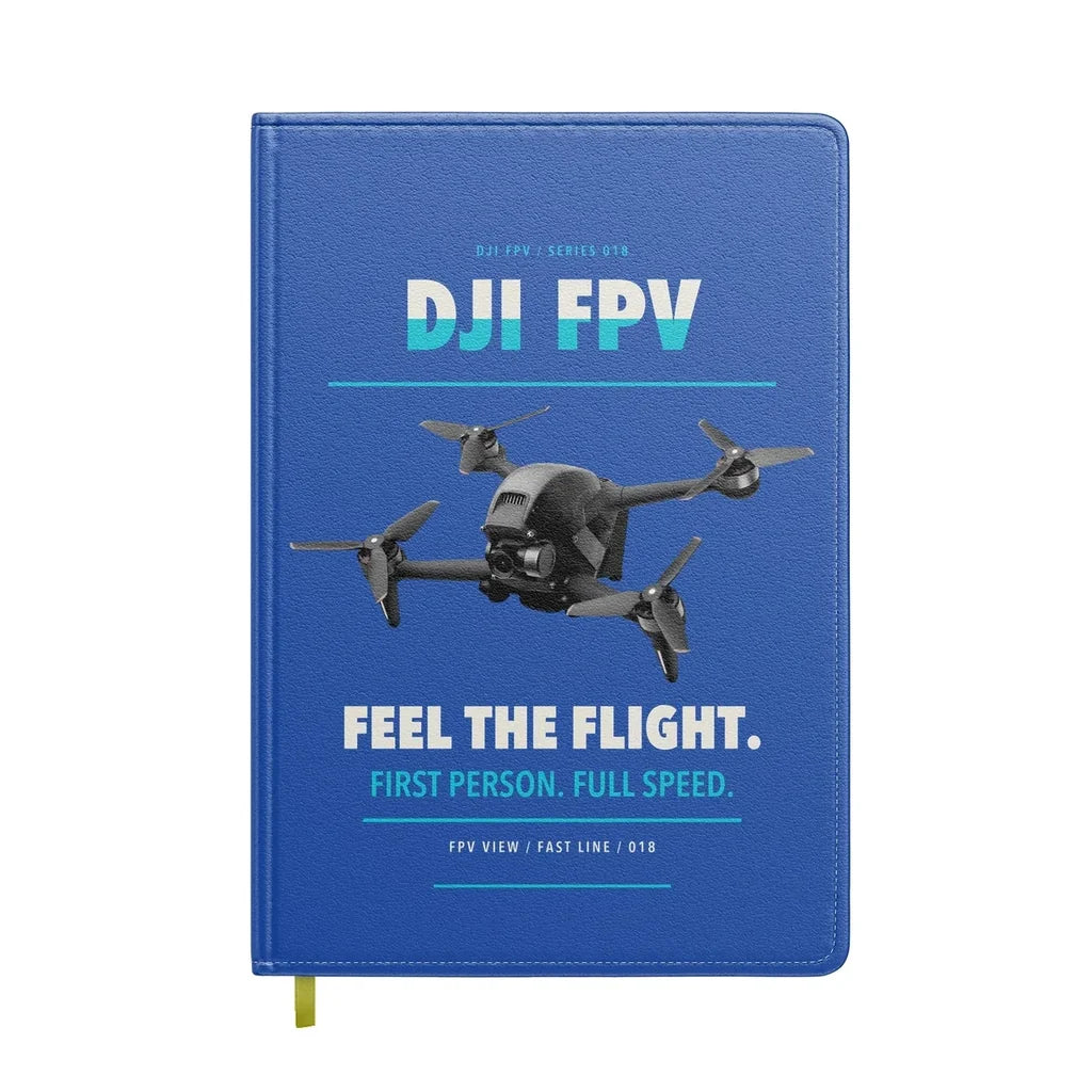 DJI FPV design on blue notebook