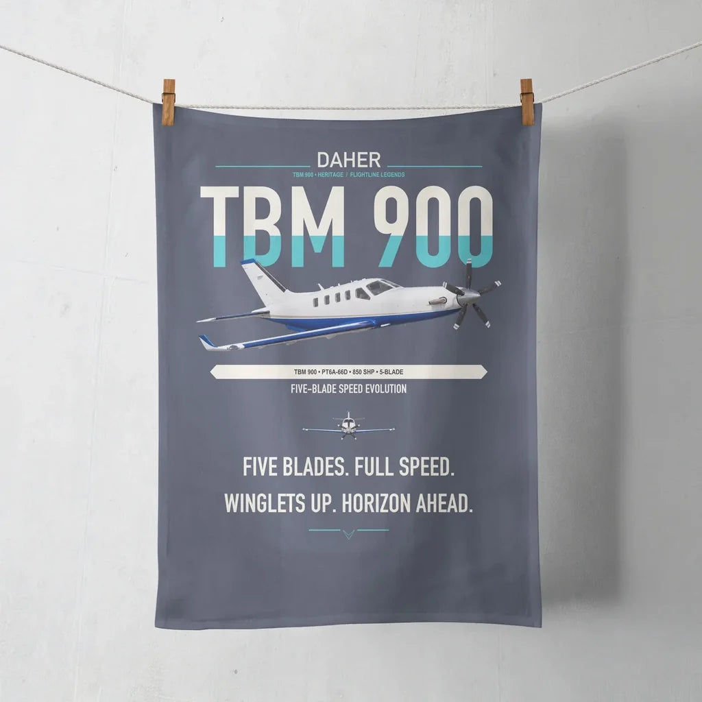 Daher TBM 900 design on navy blue towel