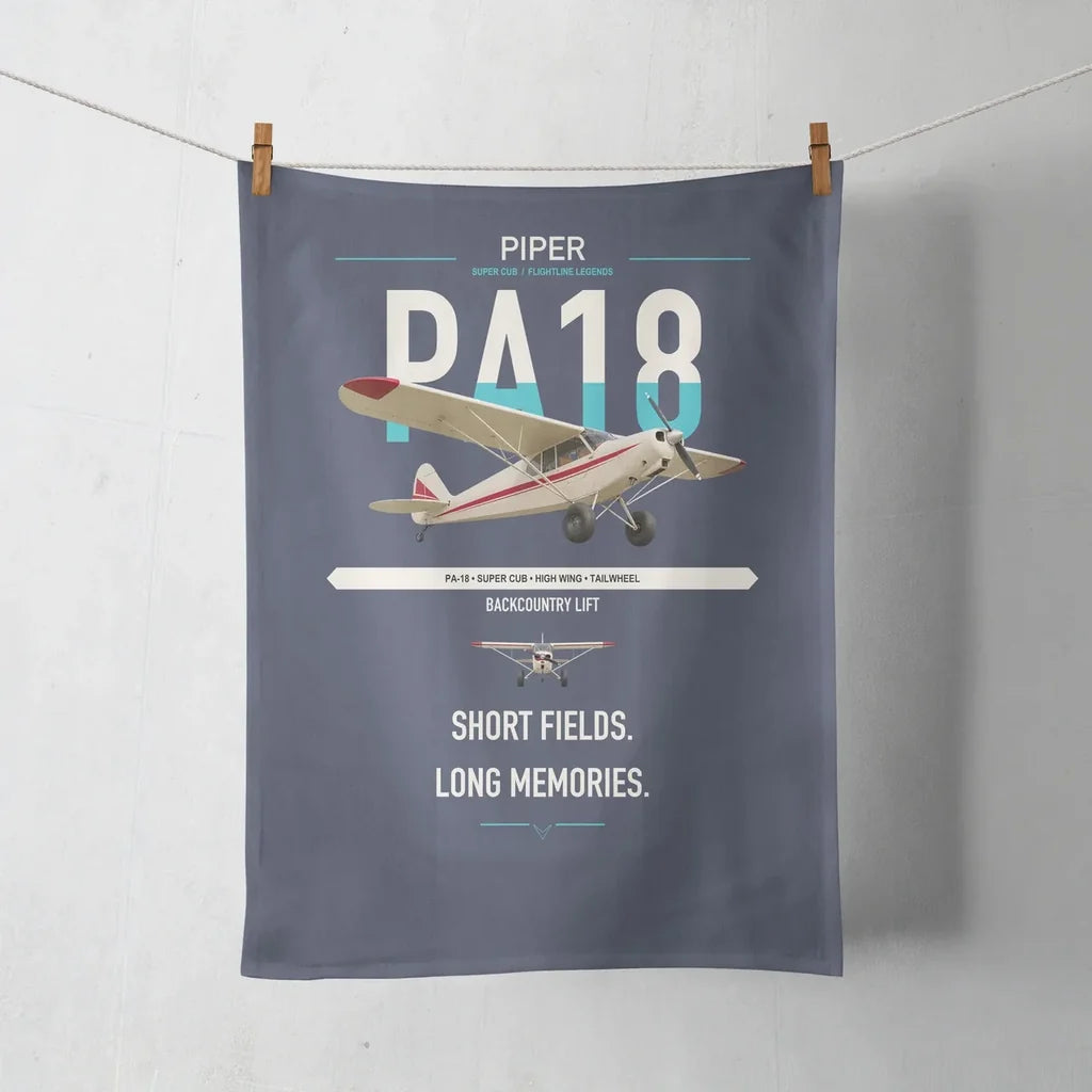 Piper PA-18 Super Cub design on navy blue towel
