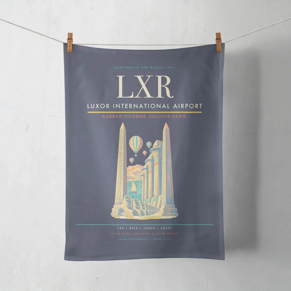 Luxor International Airport (LXR) design on navy blue towel
