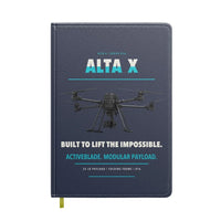 Thumbnail for Freefly Alta X design on navy blue notebook