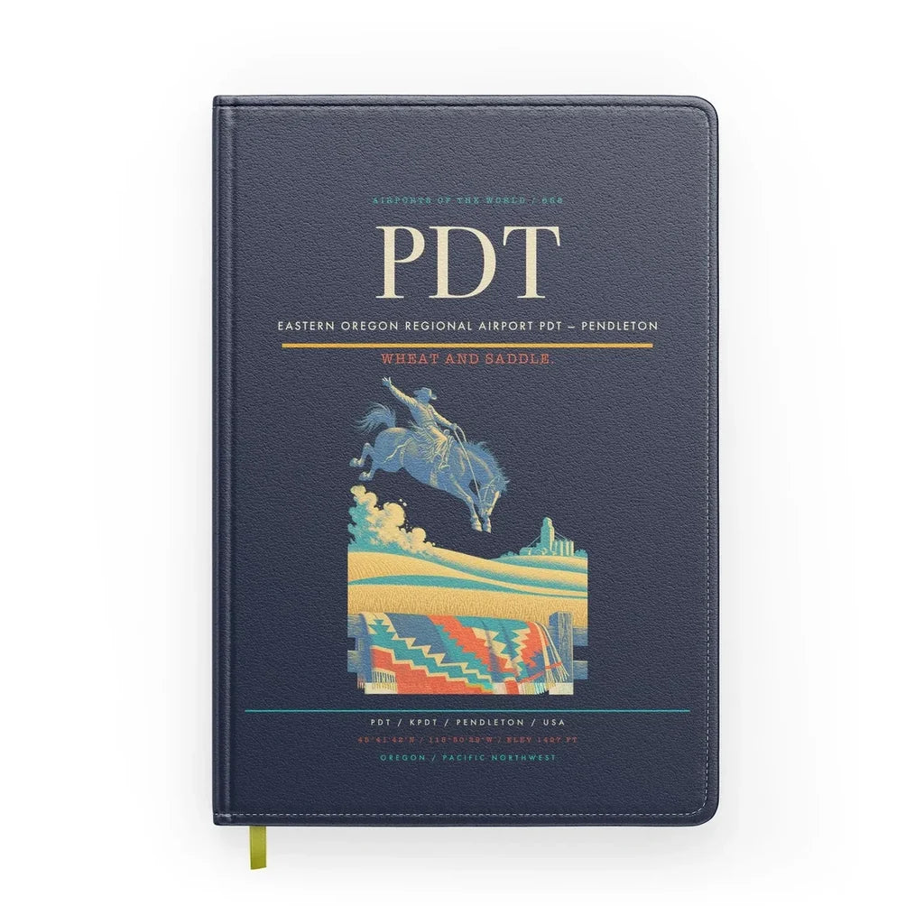 Eastern Oregon Regional Airport (PDT) design on navy blue notebook