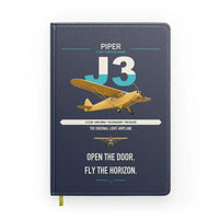 Thumbnail for Piper J-3 Cub design on navy blue notebook