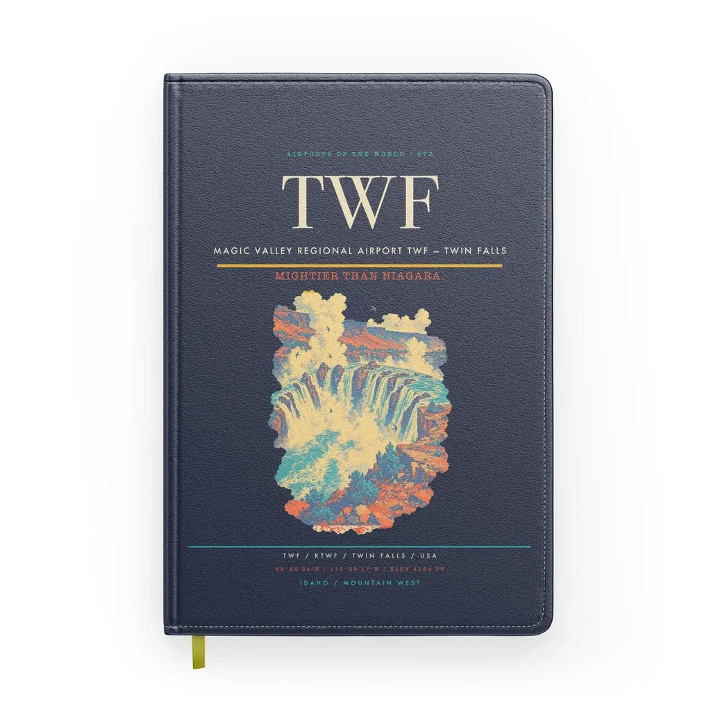 Magic Valley Regional Airport (TWF) design on navy blue notebook