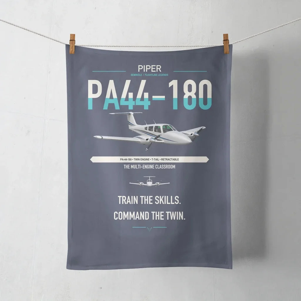 Piper PA-44-180 Seminole design on navy blue towel