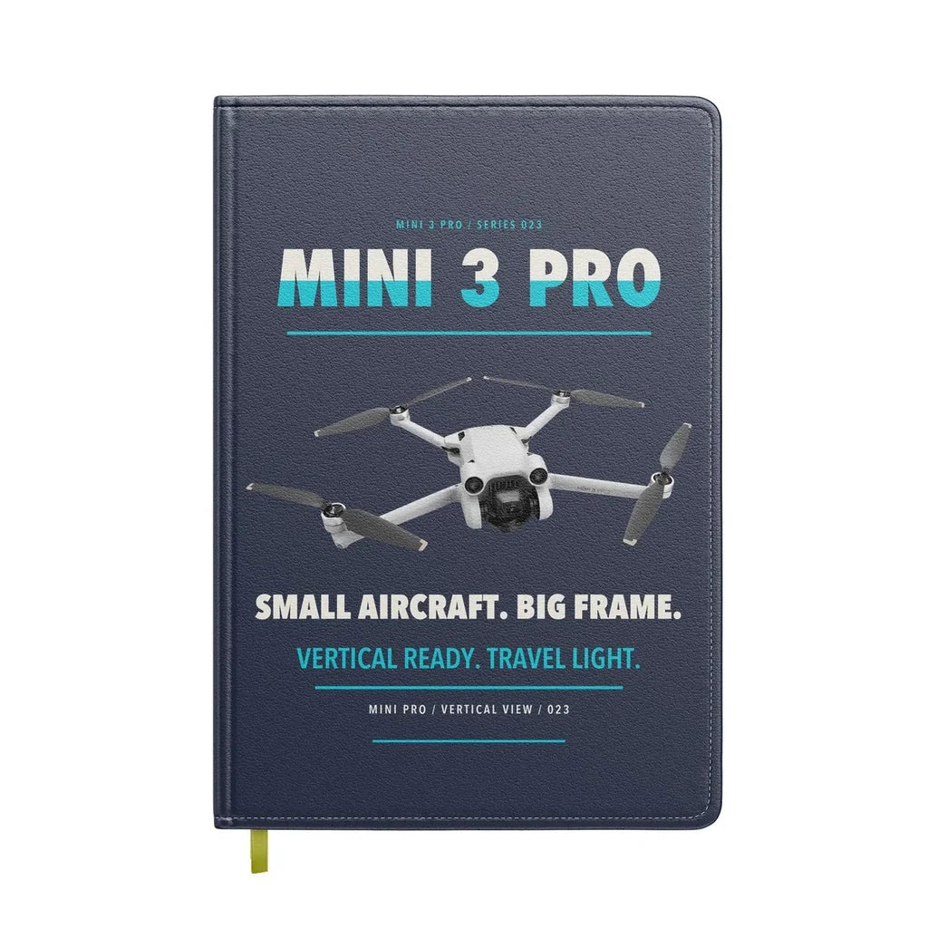 DJI Mini 3 Pro design on navy blue notebook