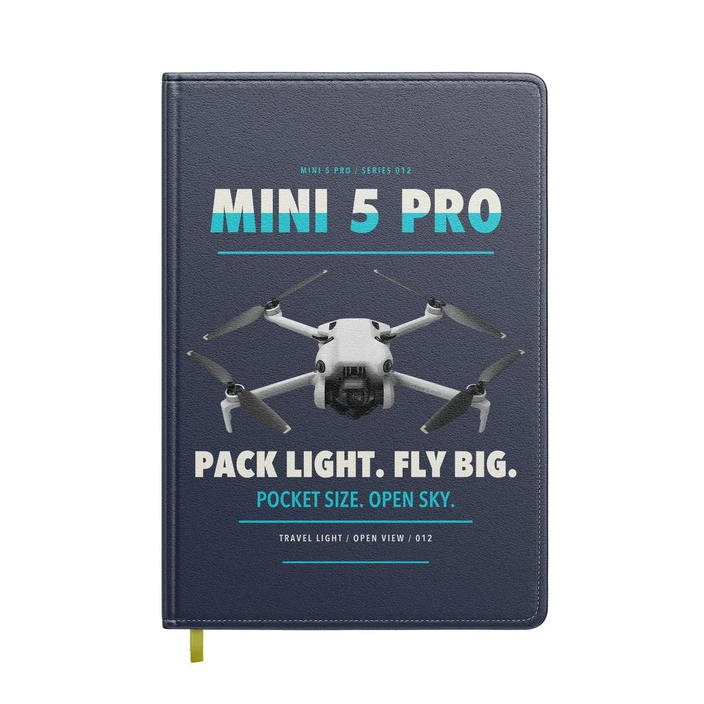 DJI Mini 5 Pro design on navy blue notebook