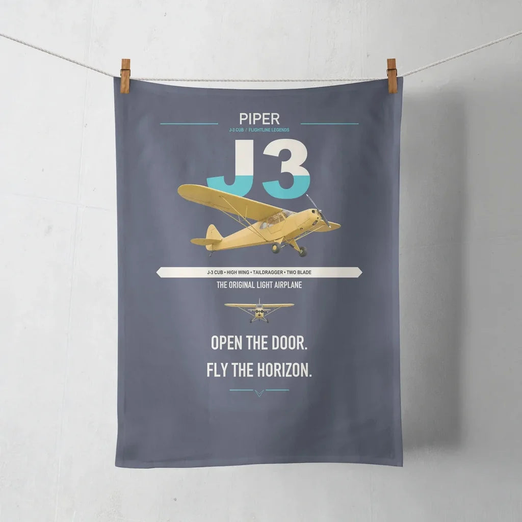 Piper J-3 Cub design on navy blue towel