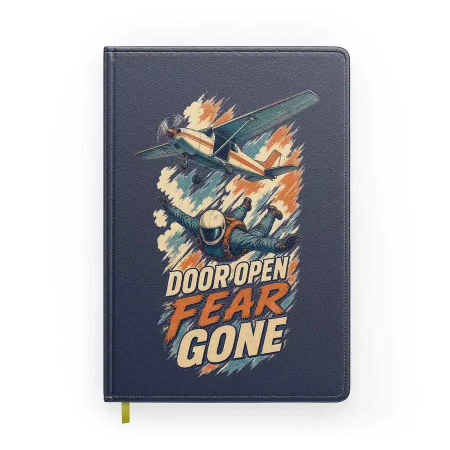 Door Open Fear Gone design on navy blue notebook