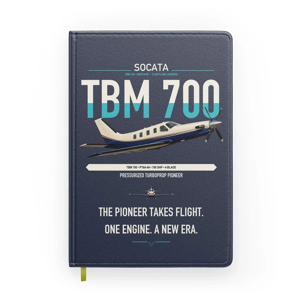Socata TBM 700 design on navy blue notebook