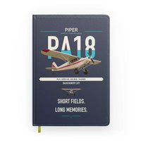 Thumbnail for Piper PA-18 Super Cub design on navy blue notebook