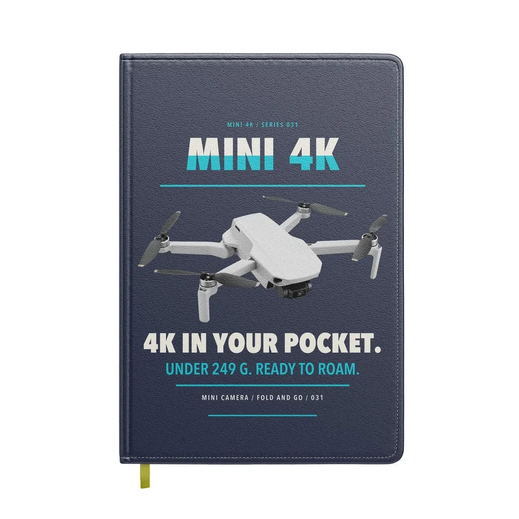 DJI Mini 4K design on navy blue notebook