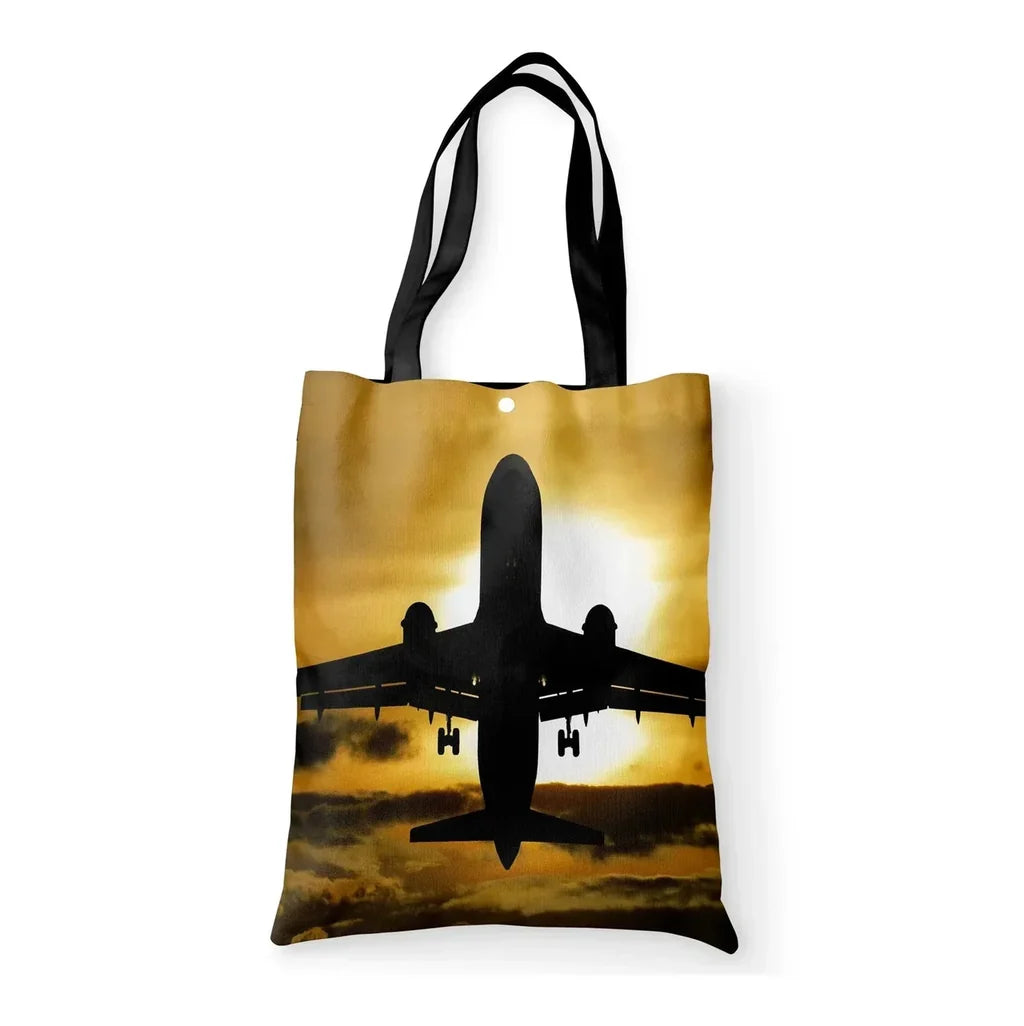 Departing Passanger Jet During Sunset aviation design tote bag, canvas construction.