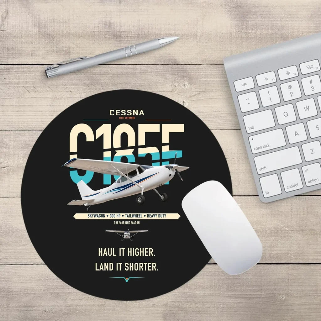 Cessna A185F Skywagon design on black round mouse pad