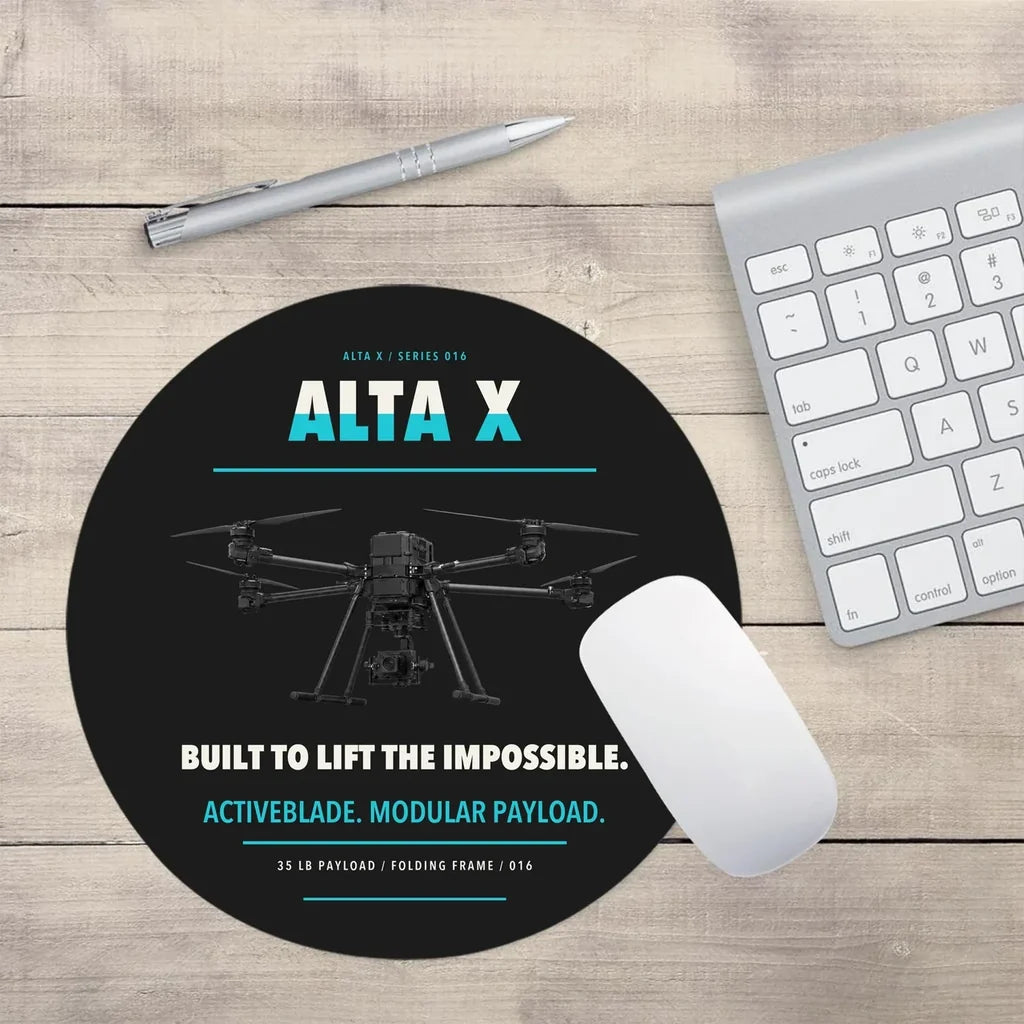 Freefly Alta X design on black round mouse pad