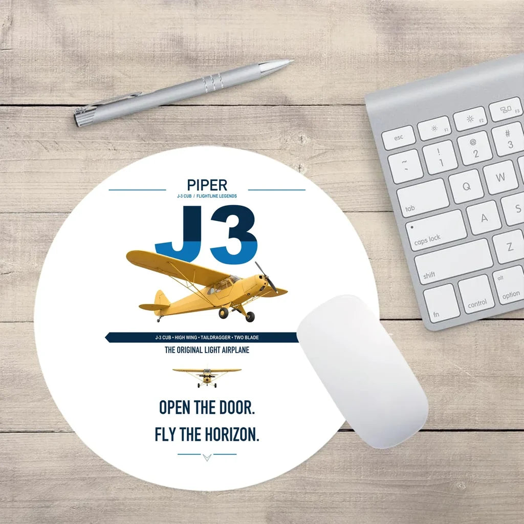 Piper J-3 Cub design on white round mouse pad
