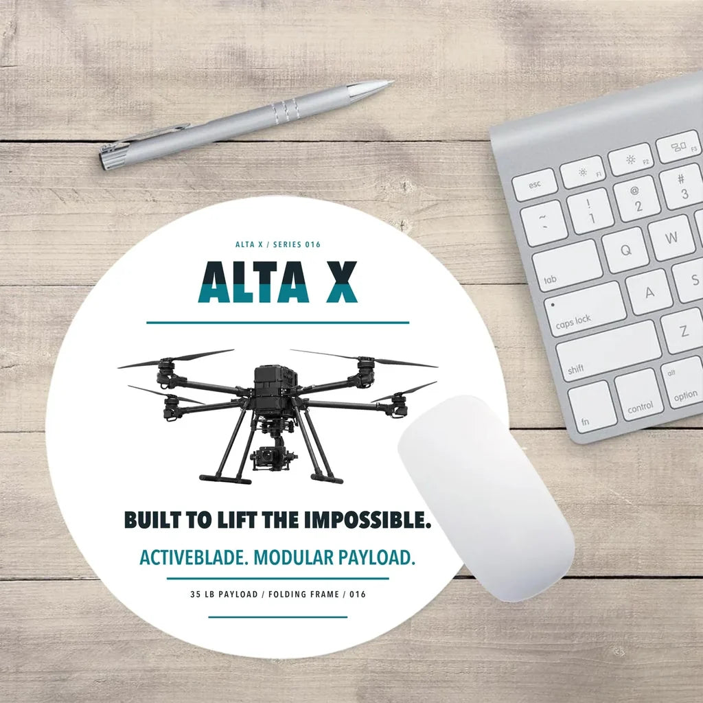 Freefly Alta X design on white round mouse pad