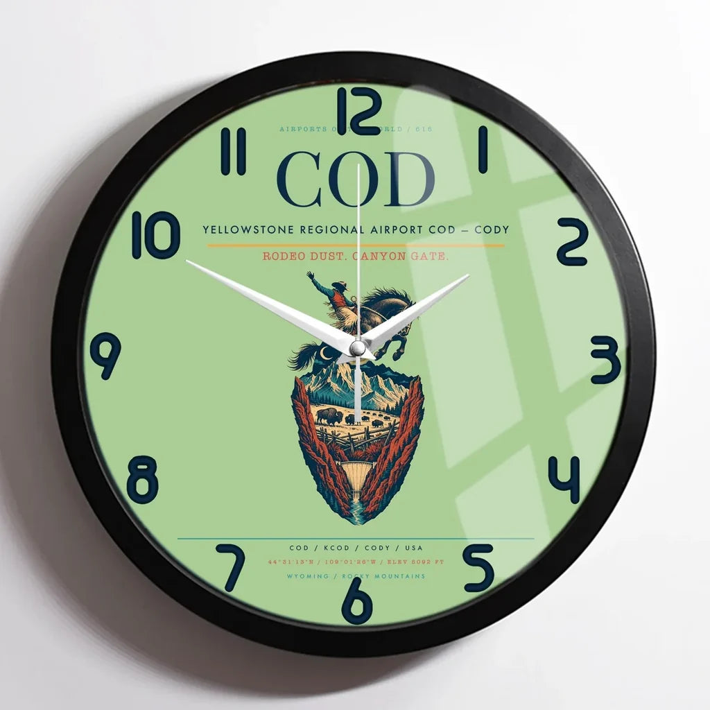 Yellowstone Regional Airport (COD) design on light green framed wall clock