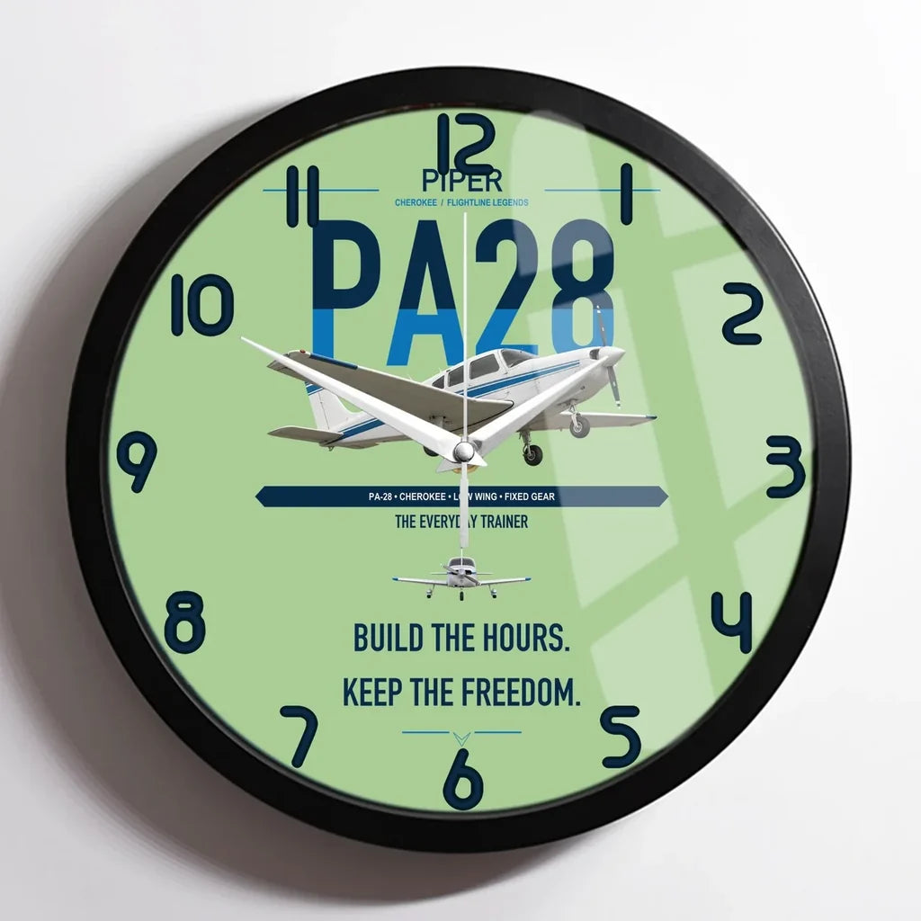 Piper PA-28 Cherokee design on light green framed wall clock