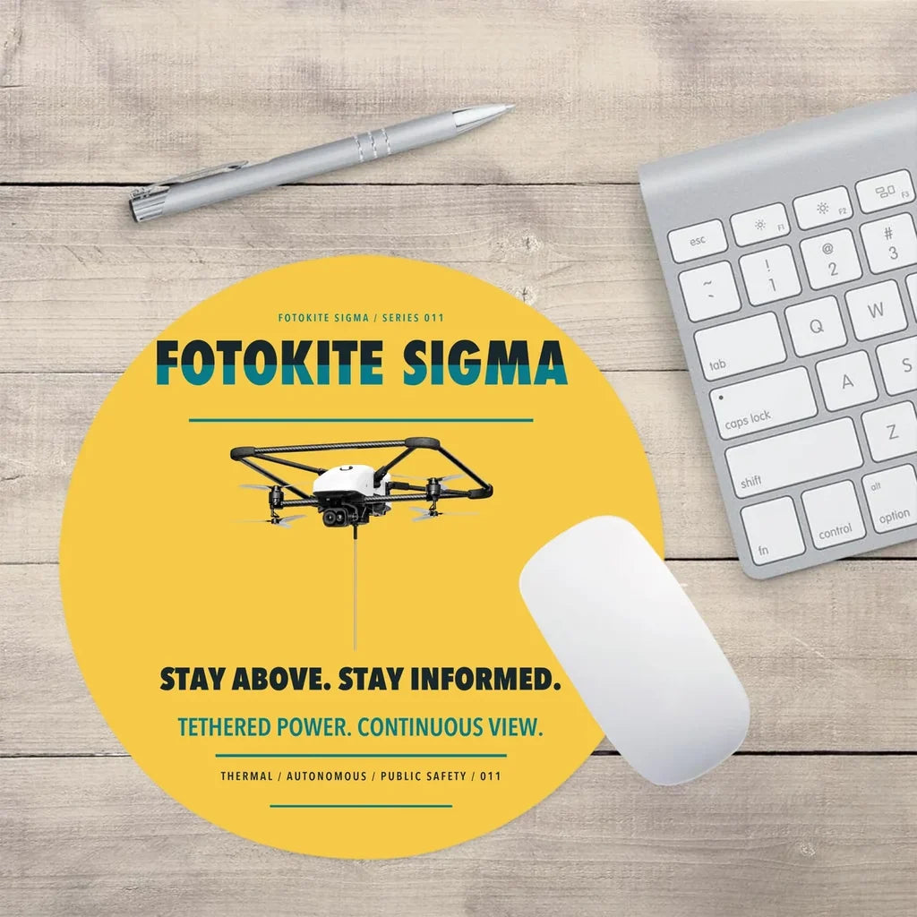 Fotokite Sigma design on yellow round mouse pad