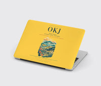 Thumbnail for Okayama Momotaro Airport (OKJ) design on yellow MacBook case